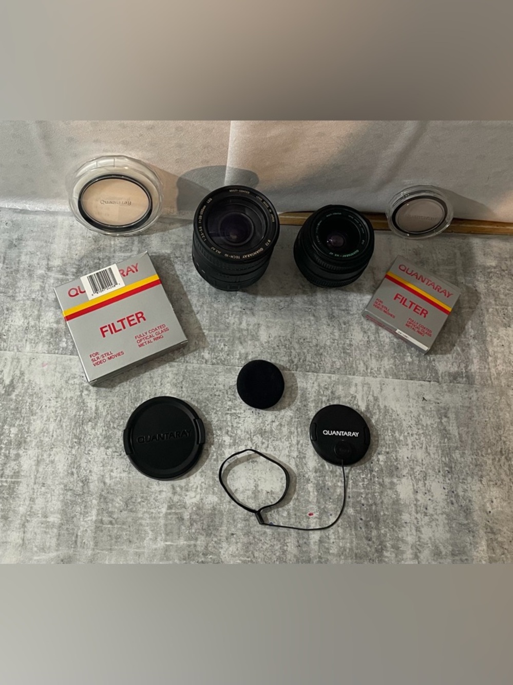 Set of (2) Quantaray Autofocus/Manualfocus Camera Lenses, Filters included. $16